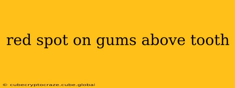 red spot on gums above tooth